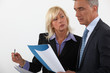 Experienced businessman people reviewing document