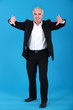 Senior businessman reaching out