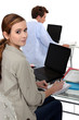 Students using laptop computers with blank screens