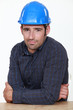 Portrait of an uneasy tradesman