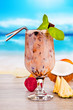 Summer drink with blur beach on background 