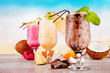 Summer drink with blur beach on background 