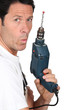 Foto: craftsman holding a drill craftsman holding a drill