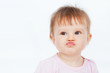 Photo: Funny baby, on a gray background Funny baby, on a gray background