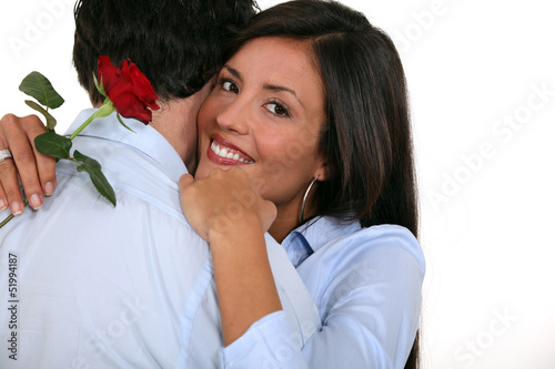 Photo: couple with rose in hand couple with rose in hand