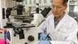 Video: Male Scientist Using Microscope In Laboratory Male Scientist Using Microscope In Laboratory