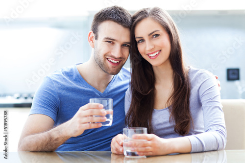 Photo: Couple with glasses of water Couple with glasses of water