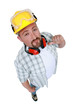Construction worker indicating himself