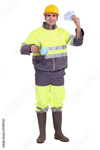 Photo: Worker holding globe Worker holding globe
