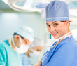 Smiley female doctor in operation room