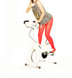 Photo: sportliche Frau auf Trimmrad sportliche Frau auf Trimmrad