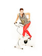 sportliche Frau auf Trimmrad