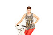 Photo: sportliche Frau auf Trimmrad sportliche Frau auf Trimmrad