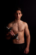 Photo: man with dumbbell in hand man with dumbbell in hand
