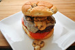 Mushroom Burger on an Onion Roll with Tomato