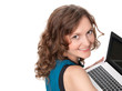 Photo: Portrait of a pretty young businesswoman holding a laptop Portrait of a pretty young businesswoman holding a laptop