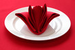 folded napkin like a rose bud, table setting