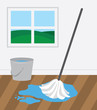 Mop and bucket cleaning wooden floor