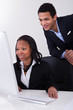 Two Business People In Office