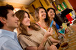 People paying for drinks at the bar