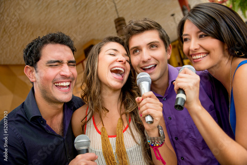 Photo: Friends karaoke singing Friends karaoke singing