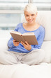 Pretty Woman Smiling On The Sofa