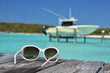 Photo: Sunglasses on the wooden jetty Sunglasses on the wooden jetty