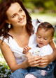 Young attractive mother with her baby
