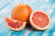Fruits: grapefruit and its slices, studio shot