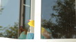 Video: Woman cleaning the window Woman cleaning the window