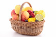 isolated fruits on wicker basket