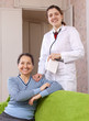 friendly doctor with happy mature woman
