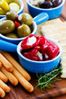 Photo: Antipasti and grissini, appetizer - mediterranean cuisine Antipasti and grissini, appetizer - mediterranean cuisine
