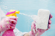 Cleaning - cleaning window pane with spray detergent