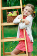 Fruit garden, orchard - lovely girl with ripe pears