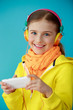 Young girl with headphones listening music