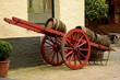 Cart loaded with wood beer barrels