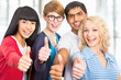 Students giving the thumbs-up sign