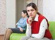 Young woman and mother after quarrel