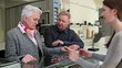 ´Senior couple buying glasses at optician