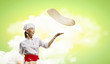 Photo: Asian female cook making pizza Asian female cook making pizza