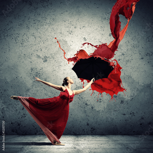 Photo: Ballet dancer in flying satin dress with umbrella Ballet dancer in flying satin dress with umbrella