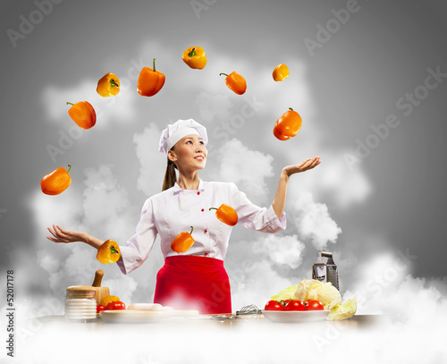 Photo: juggler female cook juggler female cook