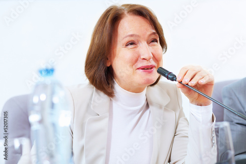 Photo: Business woman at meeting Business woman at meeting