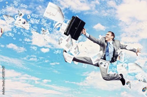 Photo: Image of jumping businessman Image of jumping businessman