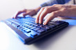 Click! Hands of a man on keyboard