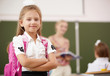 Little girl at school class