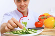 Young cook preparing food