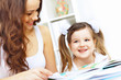 Mother and daughter studying