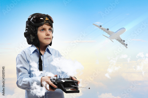 Photo: Little boy in pilot's hat Little boy in pilot's hat